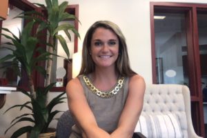 woman sitting on a chair in an office
