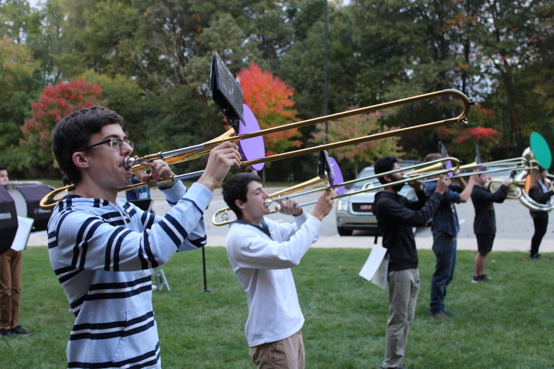 marching band students practicing outdoors