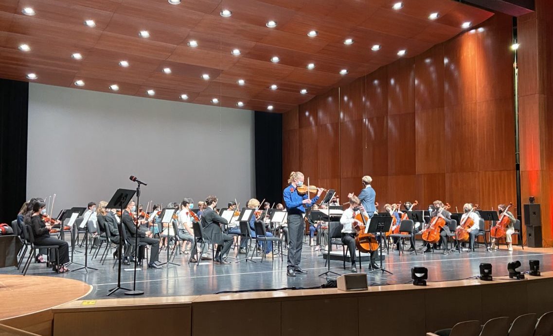 orchestra students performing at the Fine Arts Center