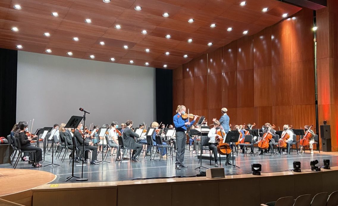 orchestra students performing at the Fine Arts Center