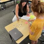 teach and child counting currency