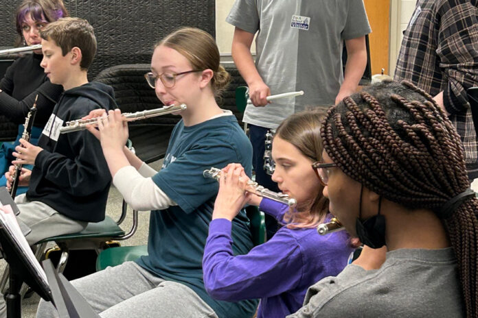 students playing instruments