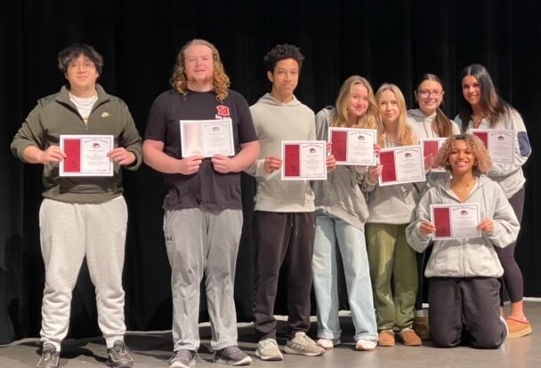 EHS Students holding up their certificates