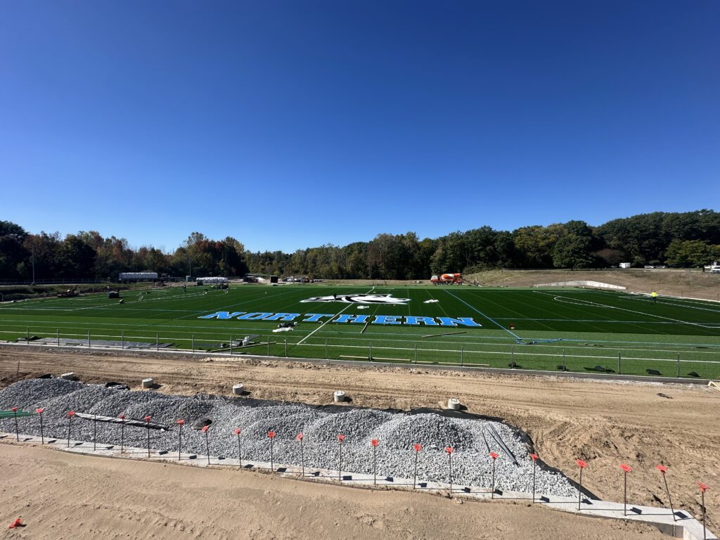 laying turf field