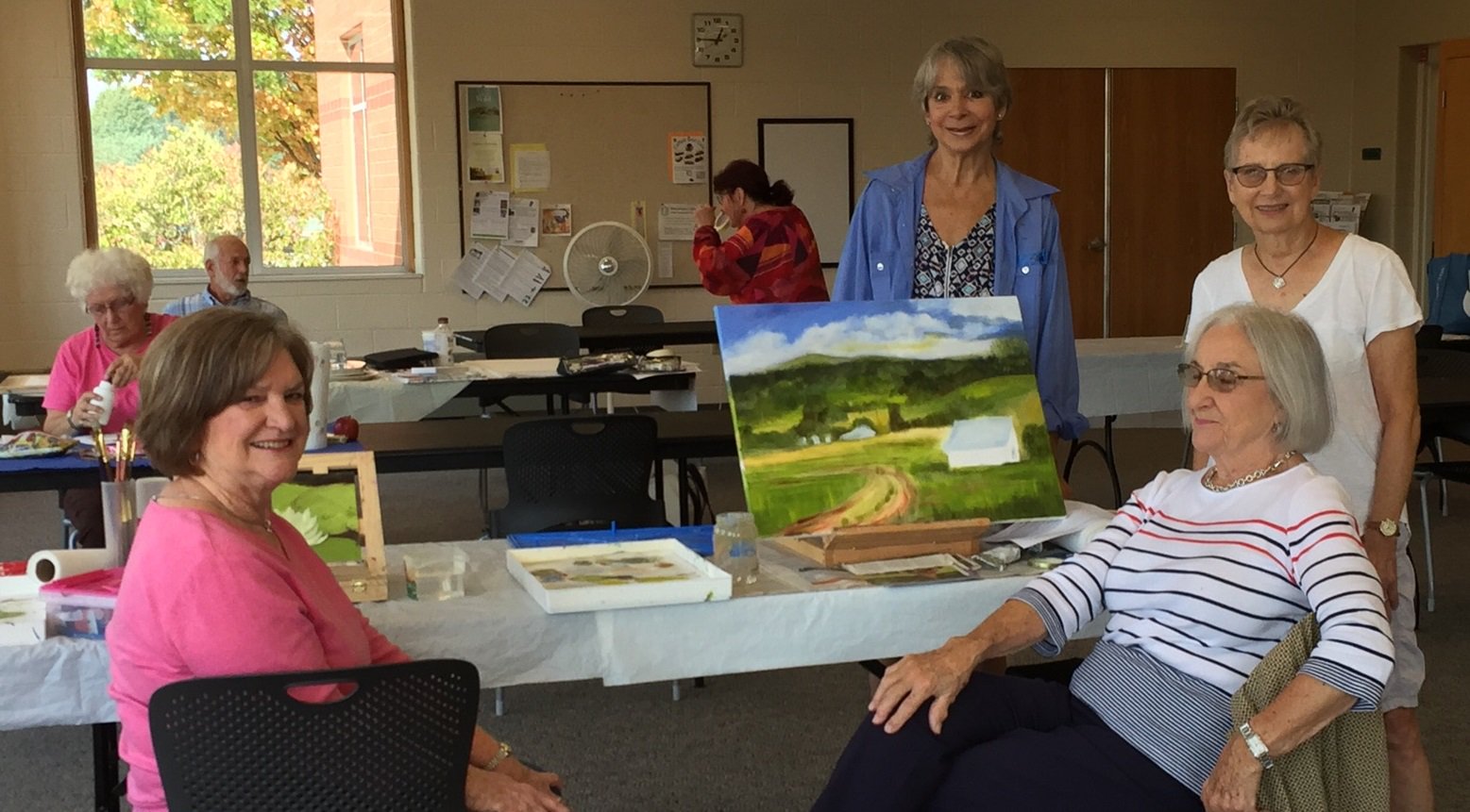 elder community members doing art