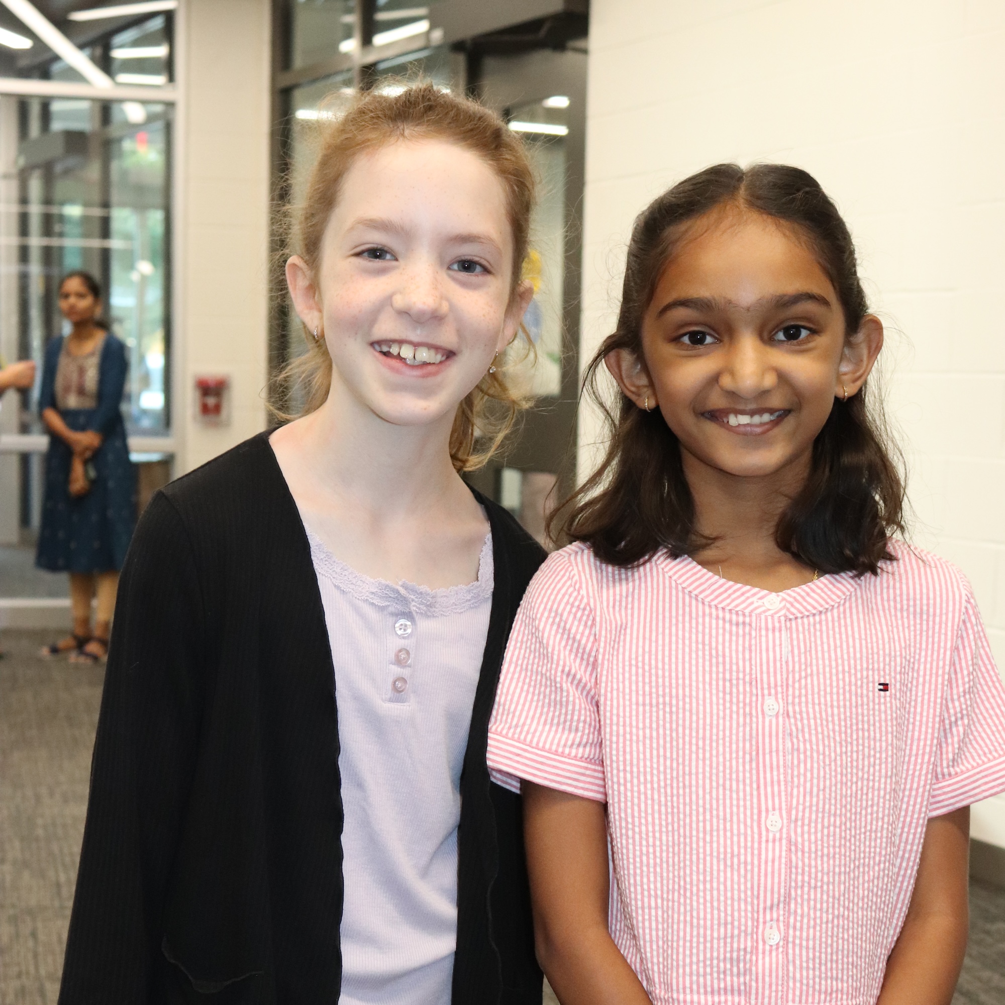 two young female students posing for a picture