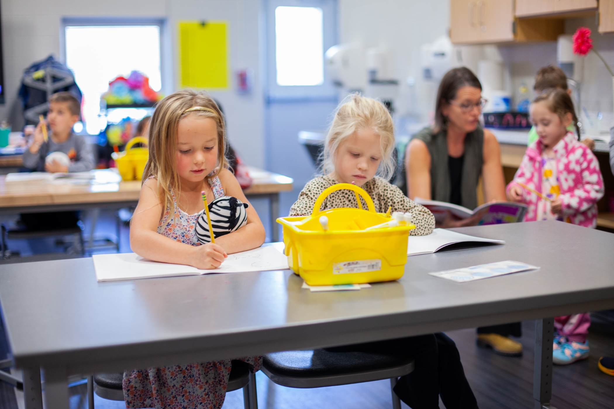 young students writing