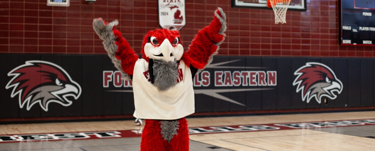 forest hills eastern mascot in a gym