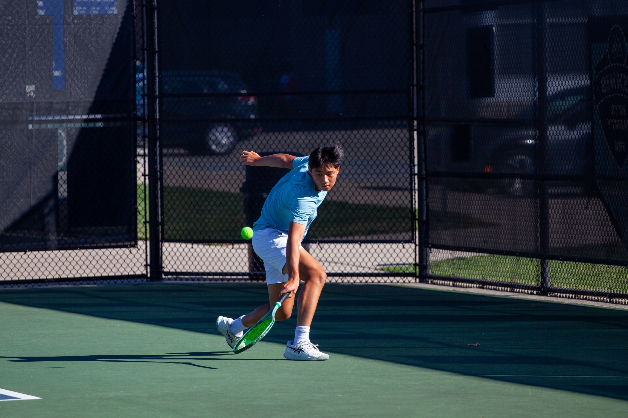Tennis player hitting a tennis ball