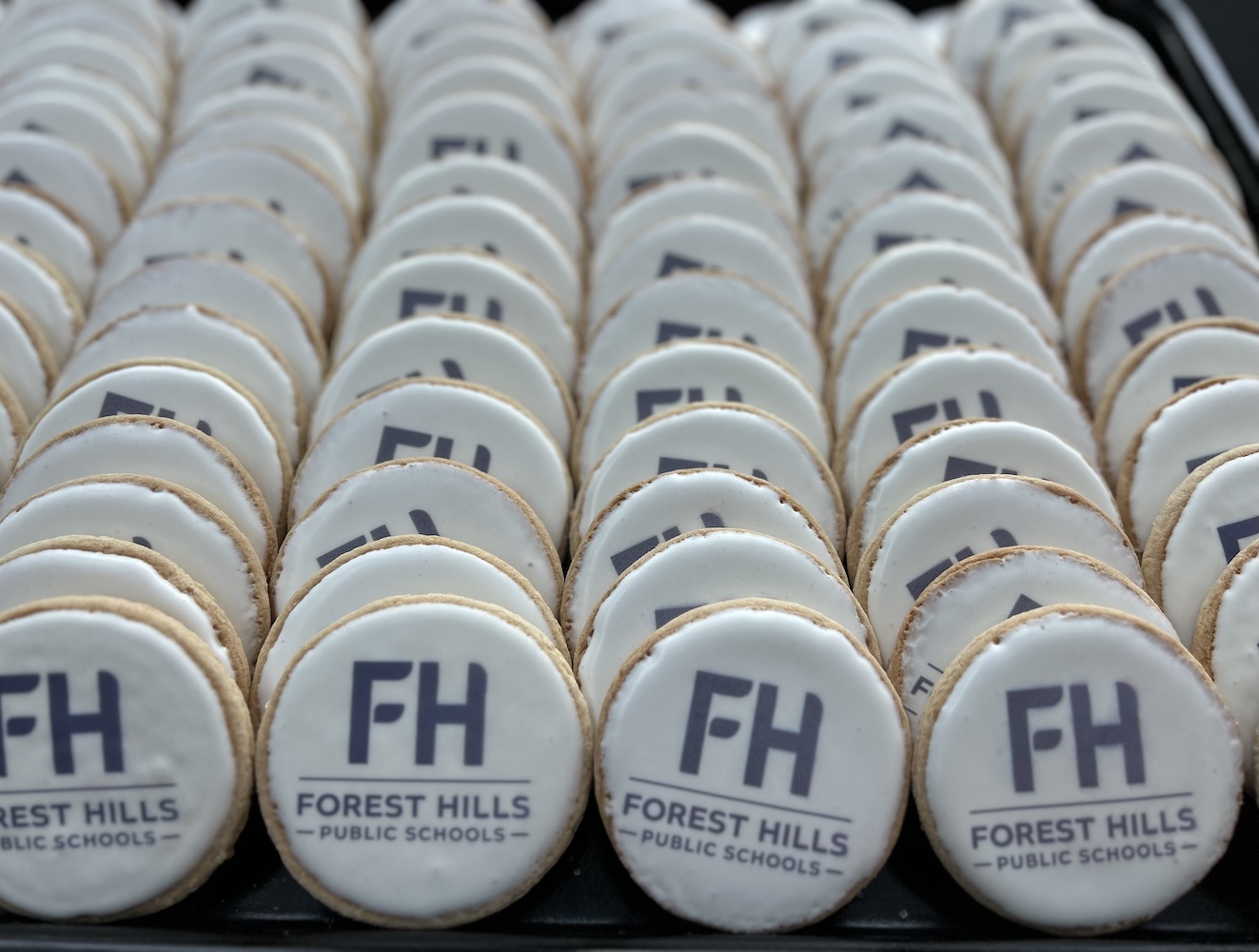 rows of cookies with the Forest Hills logo on them