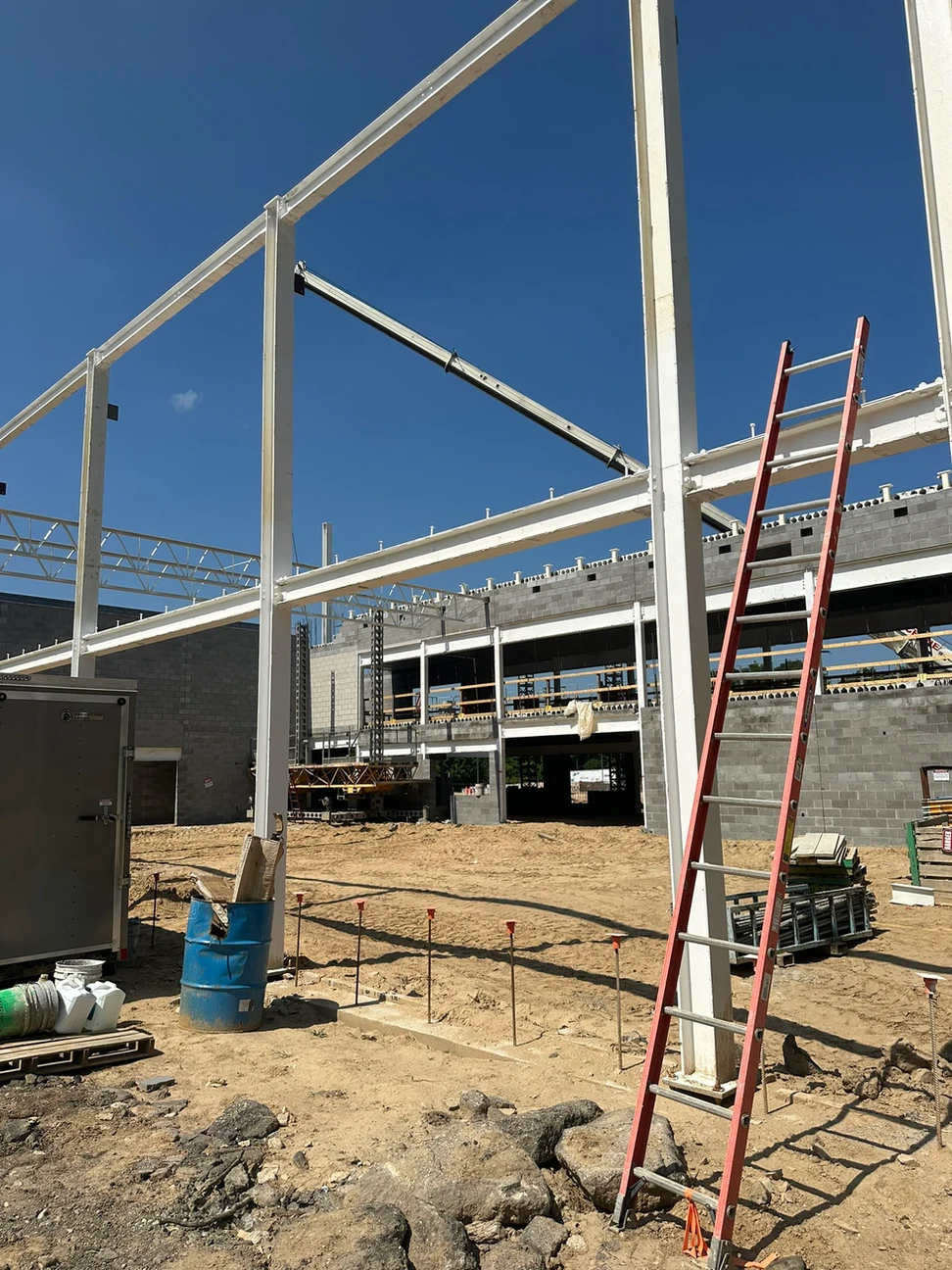Construction progress outside, framing being put in place