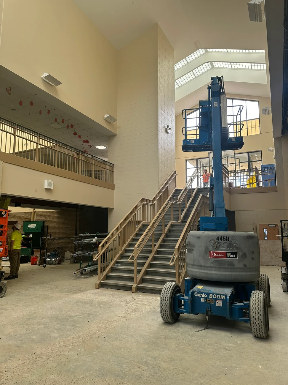 Construction progress inside with heavy machinery in use
