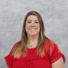 Woman in red shirt smiling